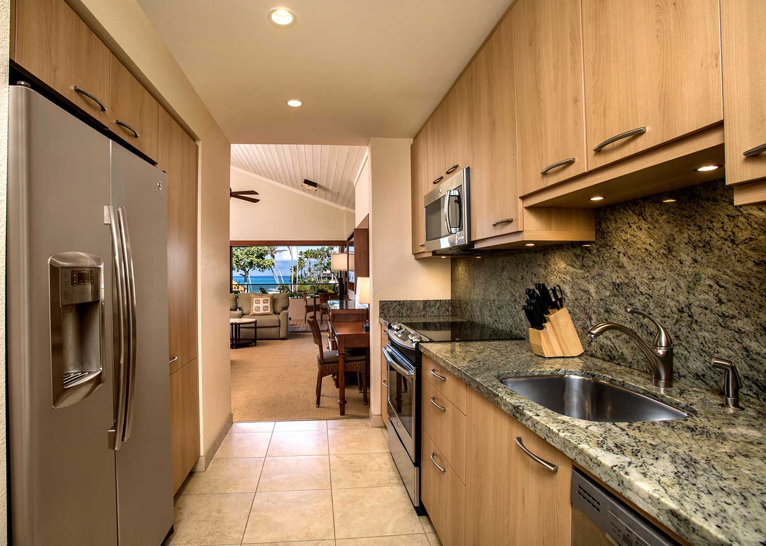 Modern kitchen with granite countertops and full appliances